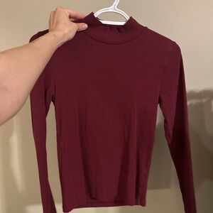 Mock Neck Long Sleeve Top in Burgundy. GAP